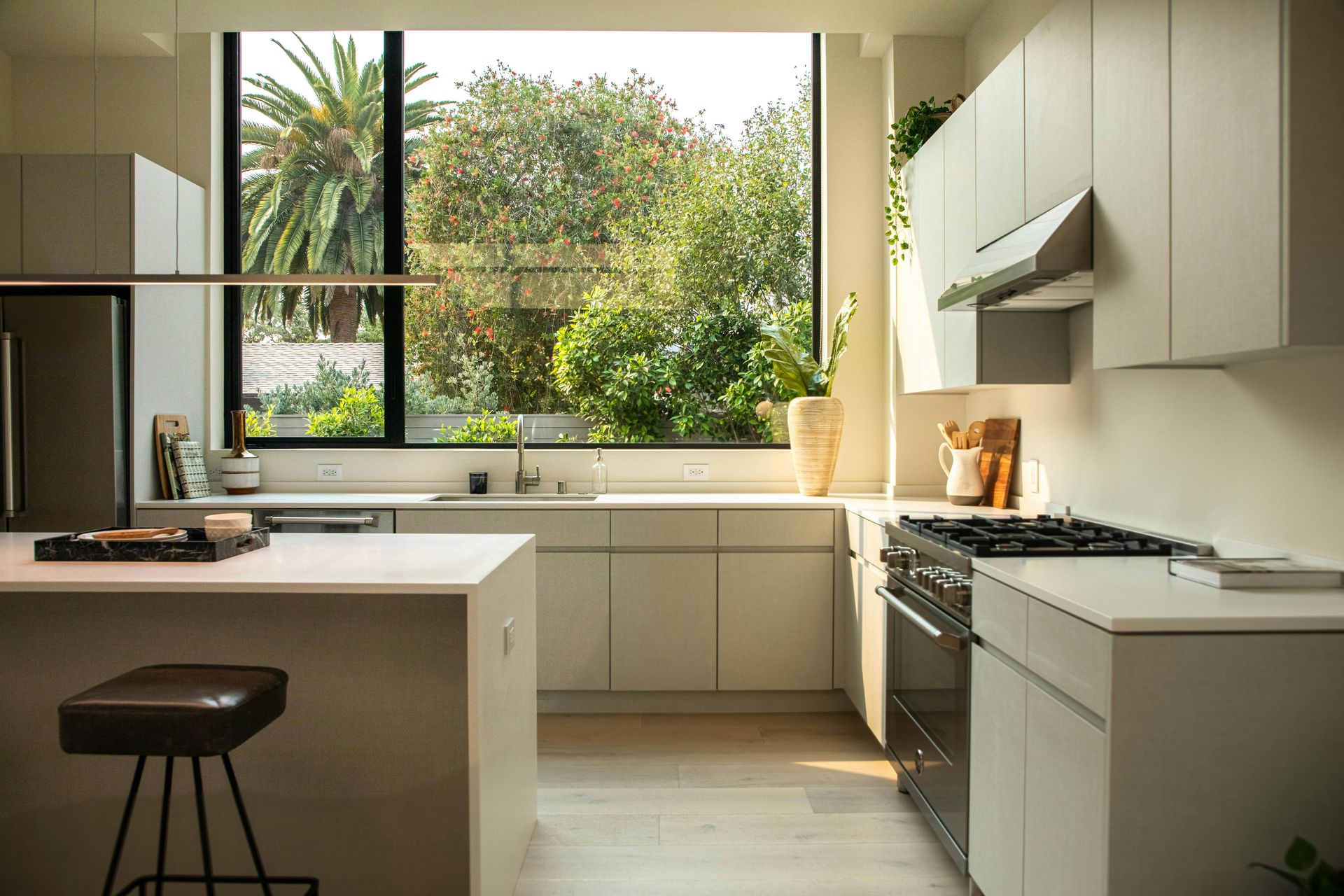 modern kitchen with island and large window